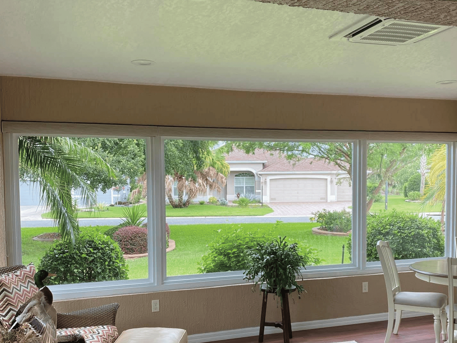 Insulated glass lanai enclosure, Florida by DNJ Construction — mini-split cooling