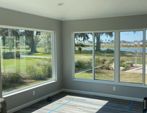 Corner glass room with water view