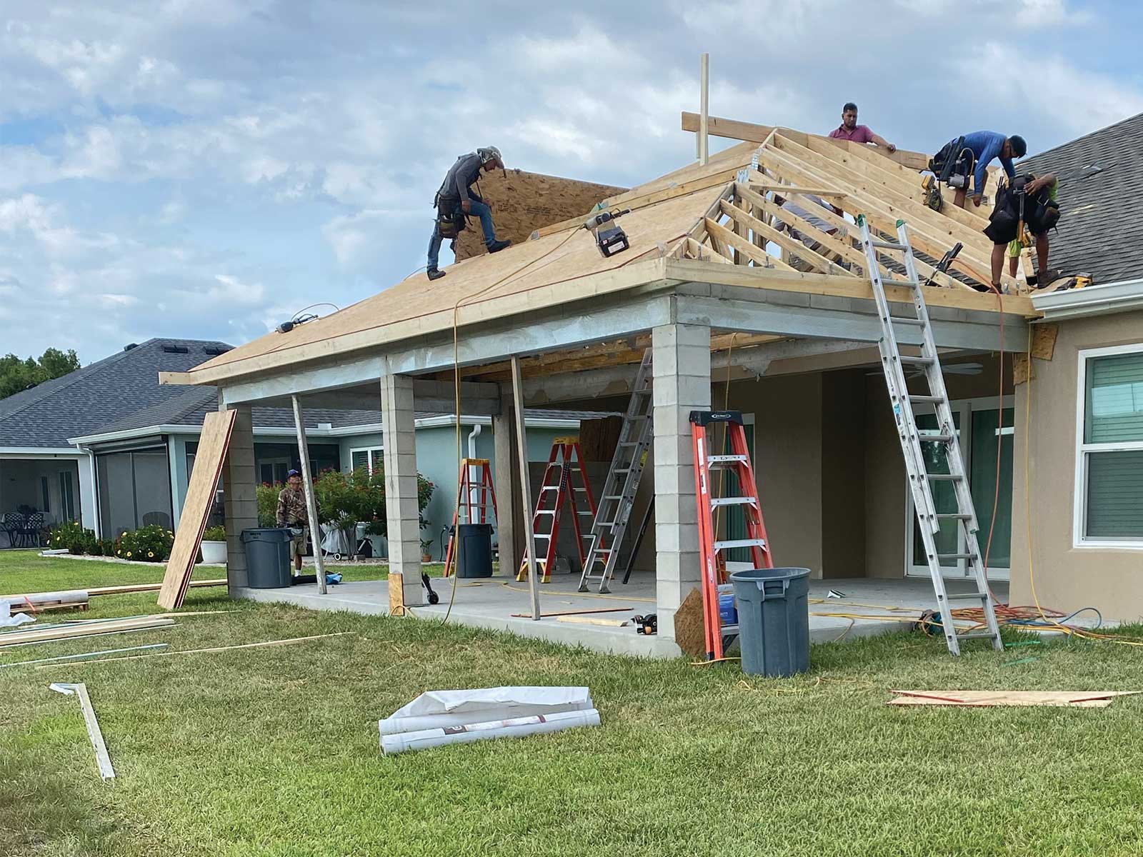Room addition with matched stucco and roofline on a home in The Villages, Florida