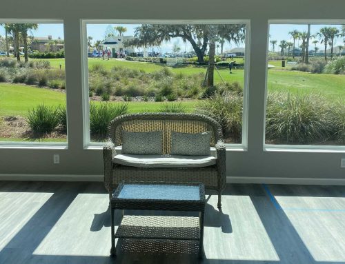 Glass lanai overlooking the golf course